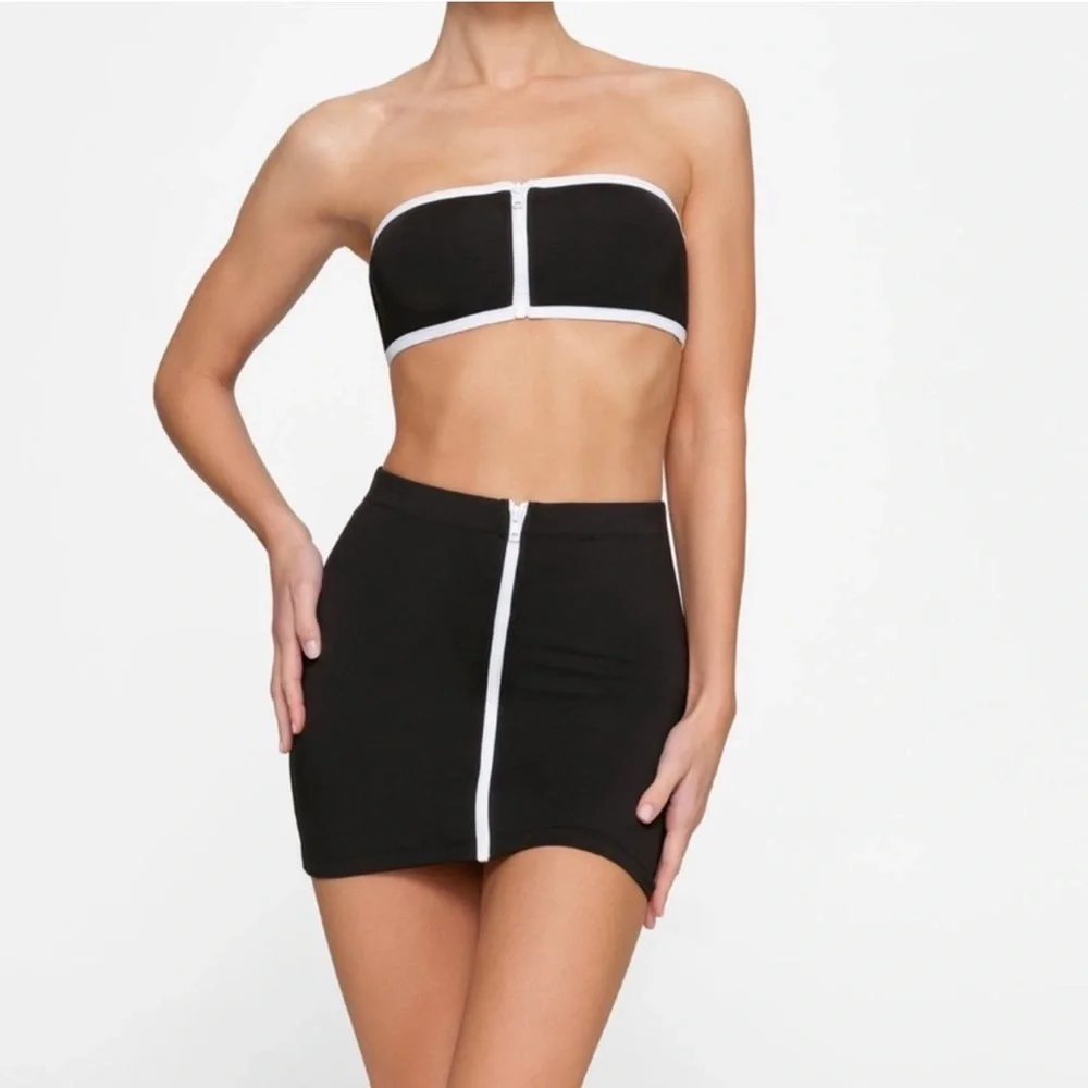 SKIMS sporty zipper swim mini skirt black p1.